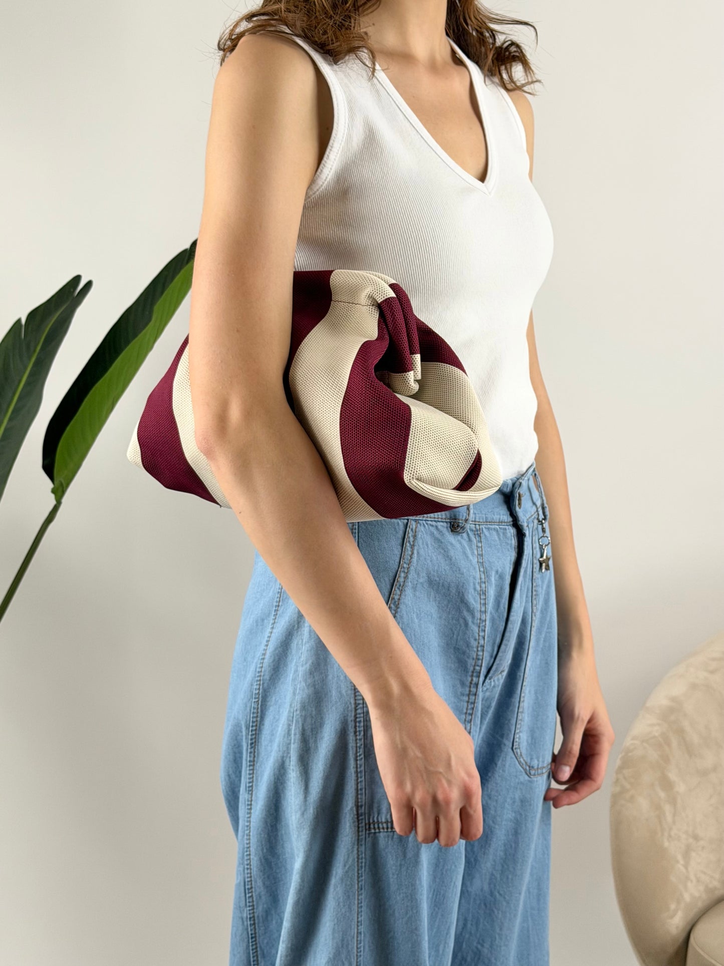 DEVA - BORSA CLUTCH RIGHE