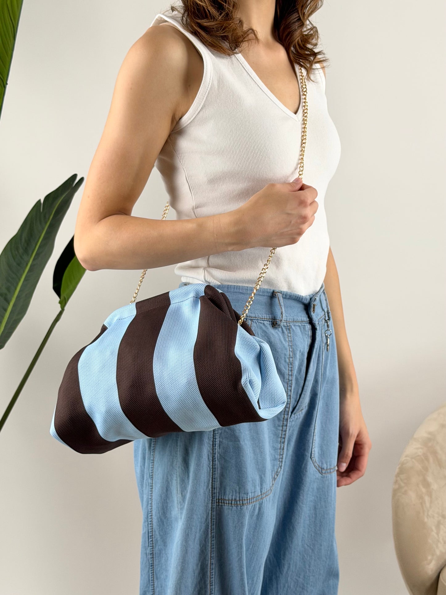 DEVA - BORSA CLUTCH RIGHE