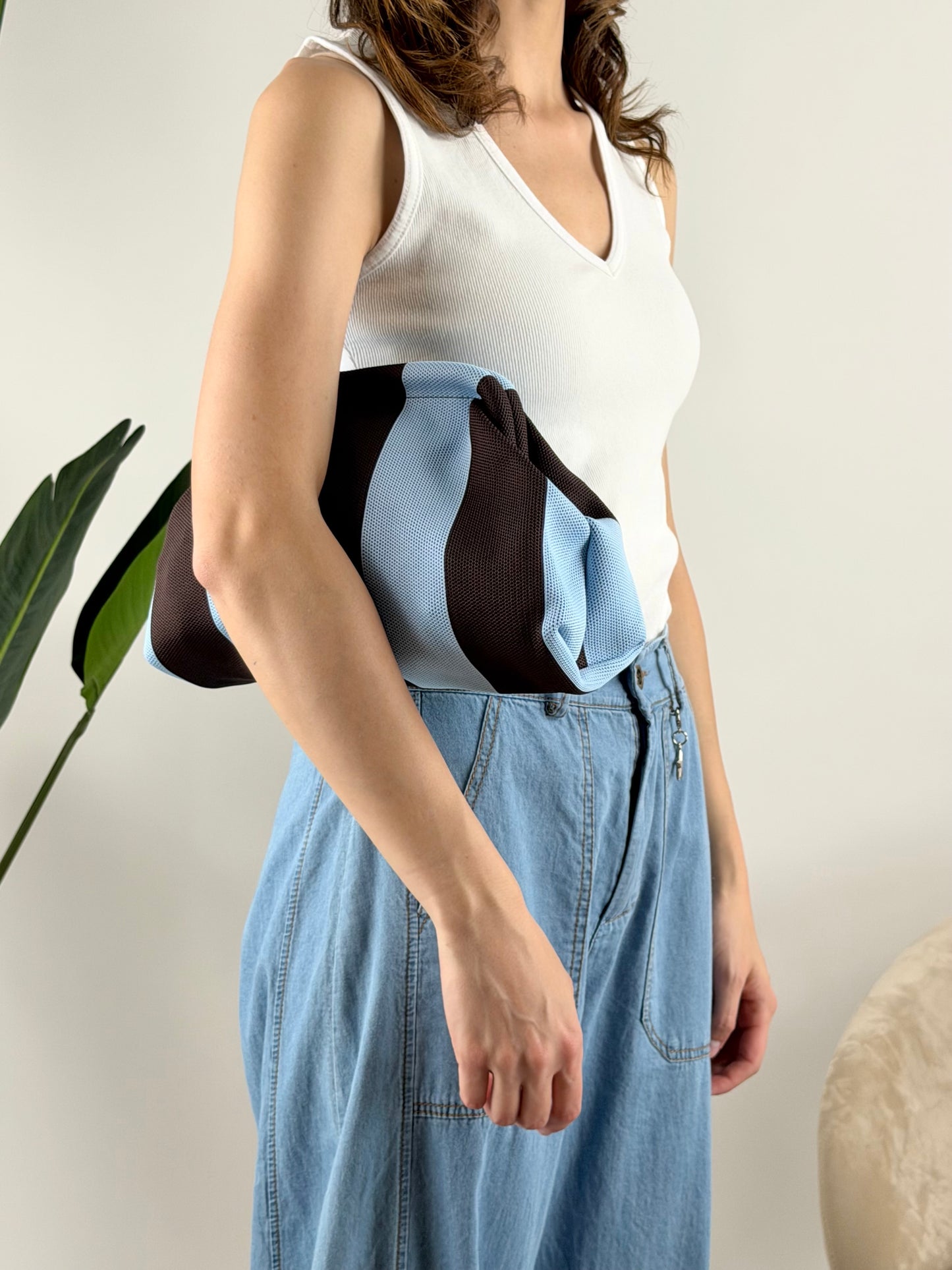 DEVA - BORSA CLUTCH RIGHE