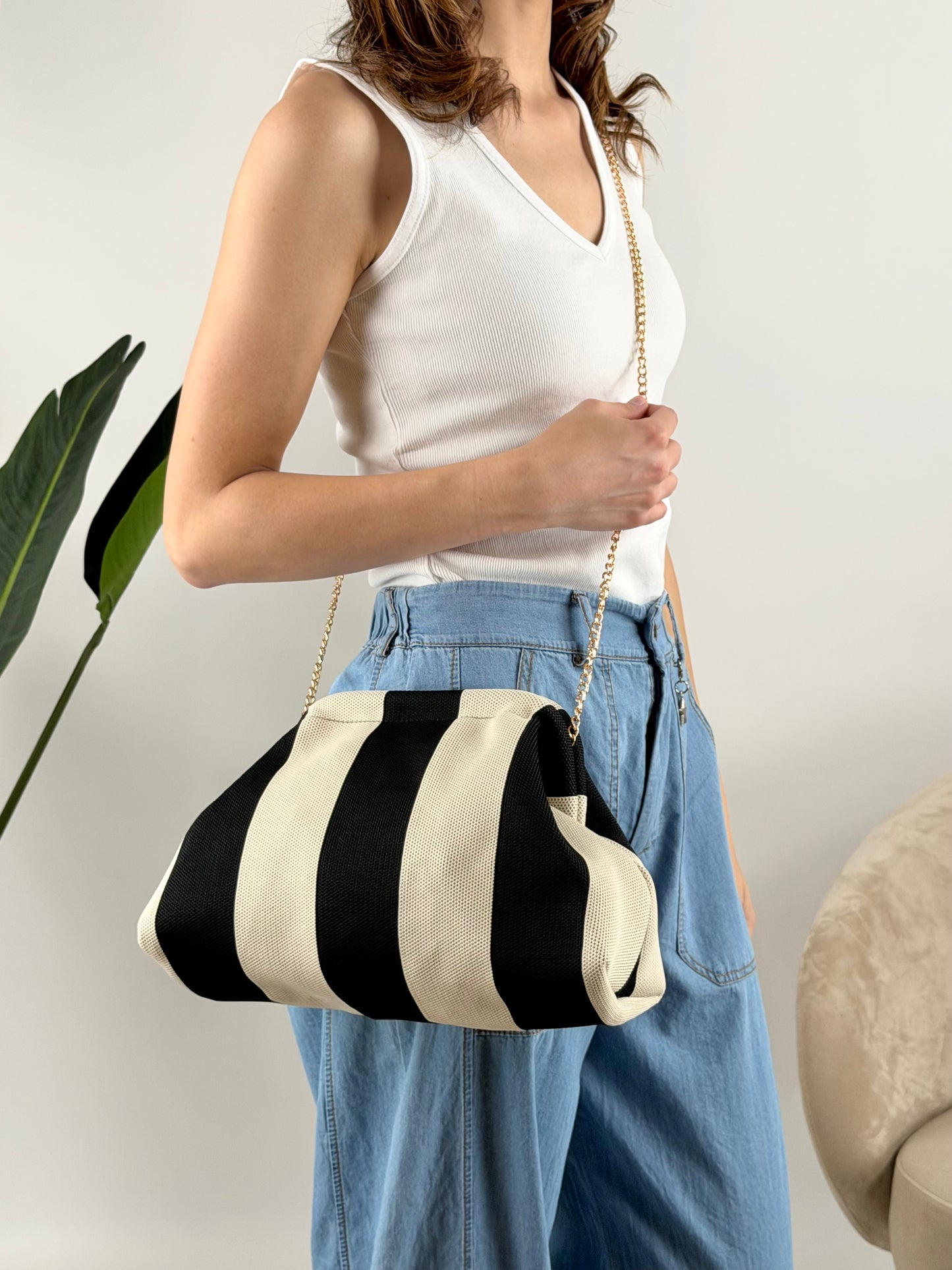 DEVA - BORSA CLUTCH RIGHE