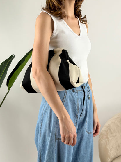 DEVA - BORSA CLUTCH RIGHE